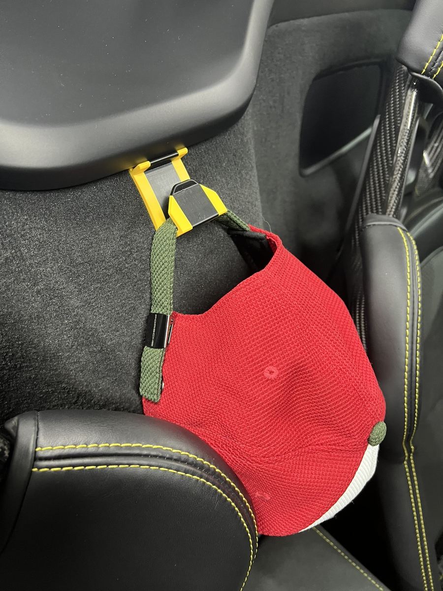 Boxster Cap Hook A two-tone hook for the rear bulkhead